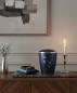 Preview: Elegant midnight blue urn with glossy silver band and 4 paw prints. A luxurious, dignified keepsake for your darling. Honour your pet's memory beautifully – see the options and order.
